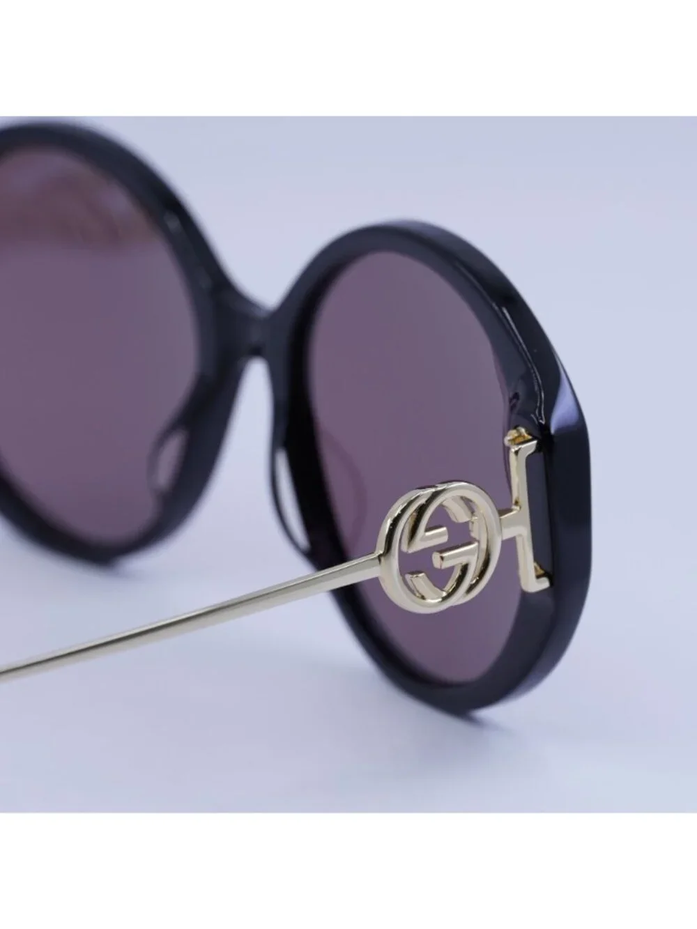 Gucci GG1202S 001 Sunglasses Black Round Frame, Brown Lenses
